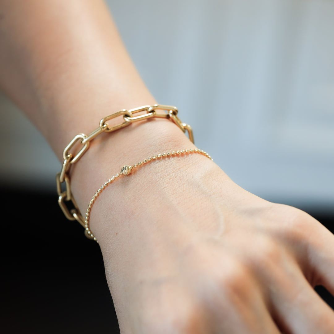 Rain-Cut Bead Bracelet with Elegant Centerpiece Sphere in 14K Gold